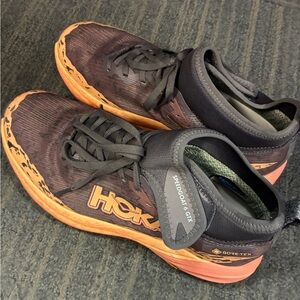 Hoka Women’s Black and Orange Speedgoat 6 GTX Shoes
